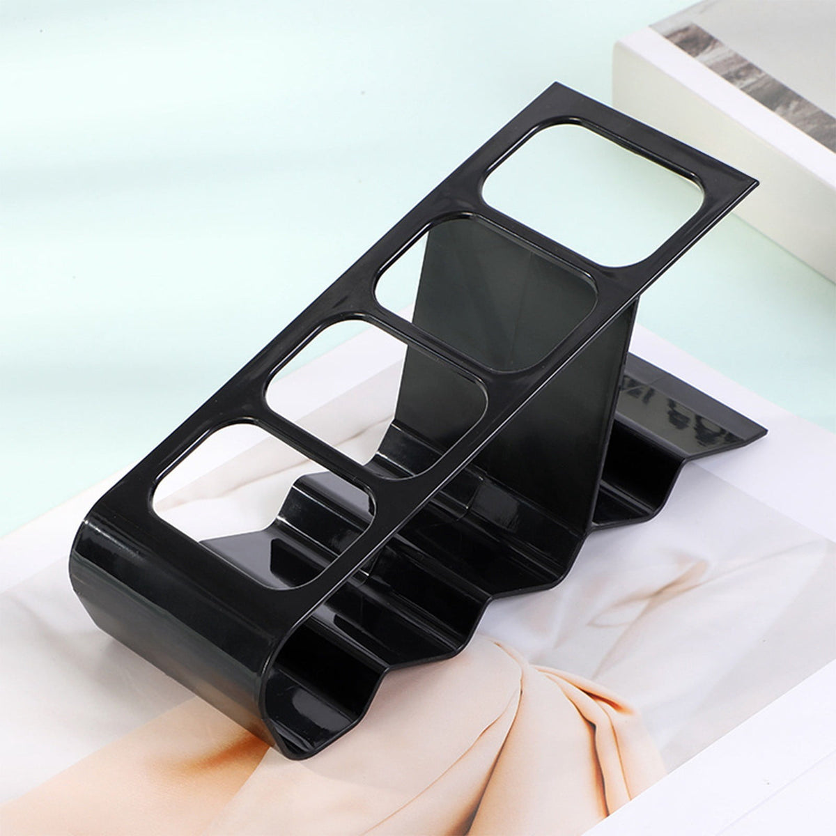Four-Slot Remote Control Caddy in Black Plastic, Compact Desktop Holder for Controllers and Pens - Image 4