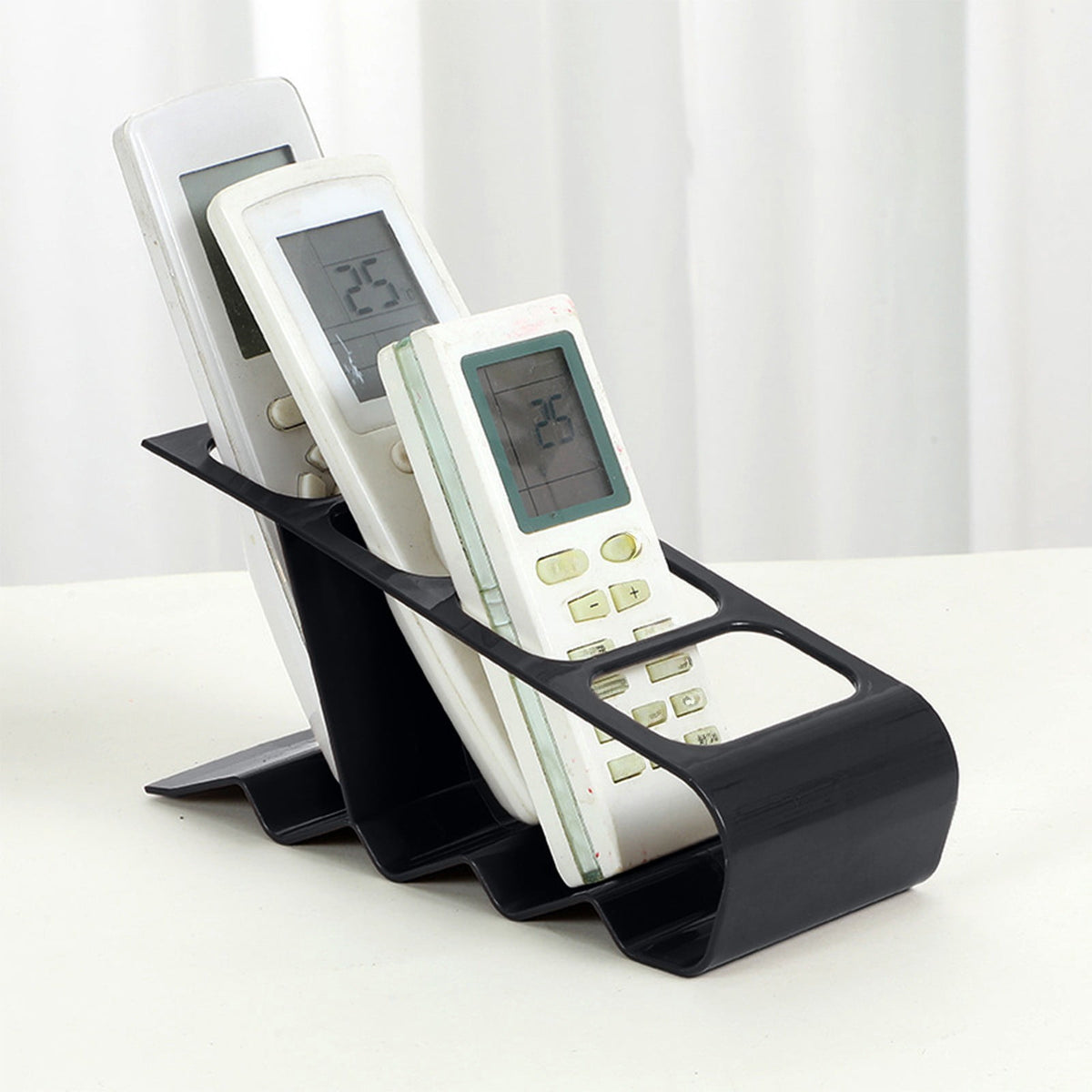 Four-Slot Remote Control Caddy in Black Plastic, Compact Desktop Holder for Controllers and Pens - Image 5